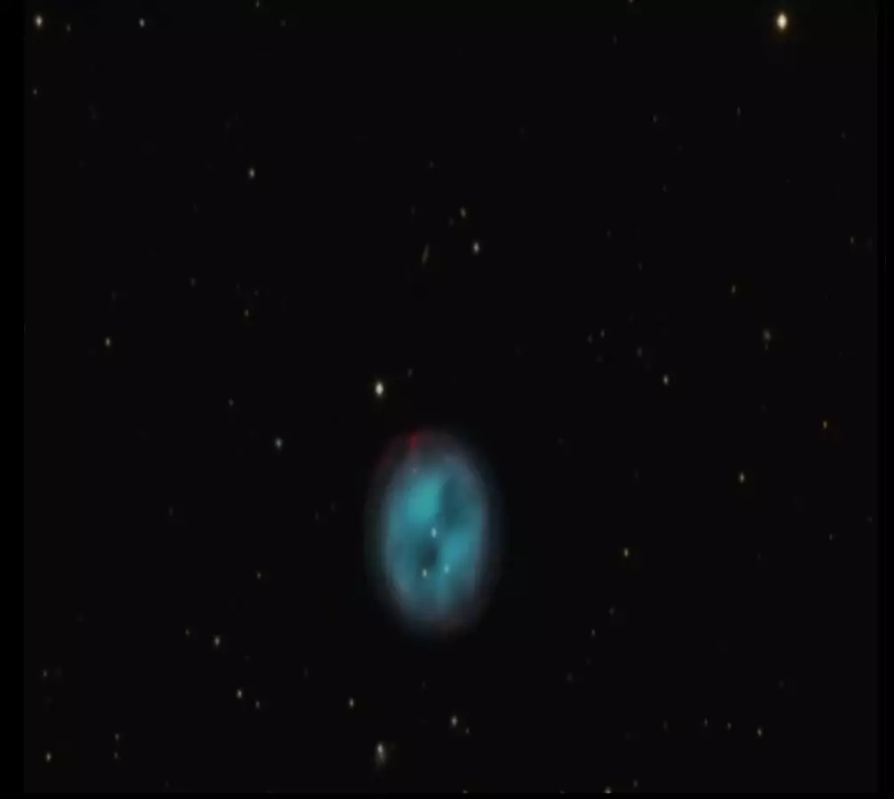 M57 con la galassia IC1296